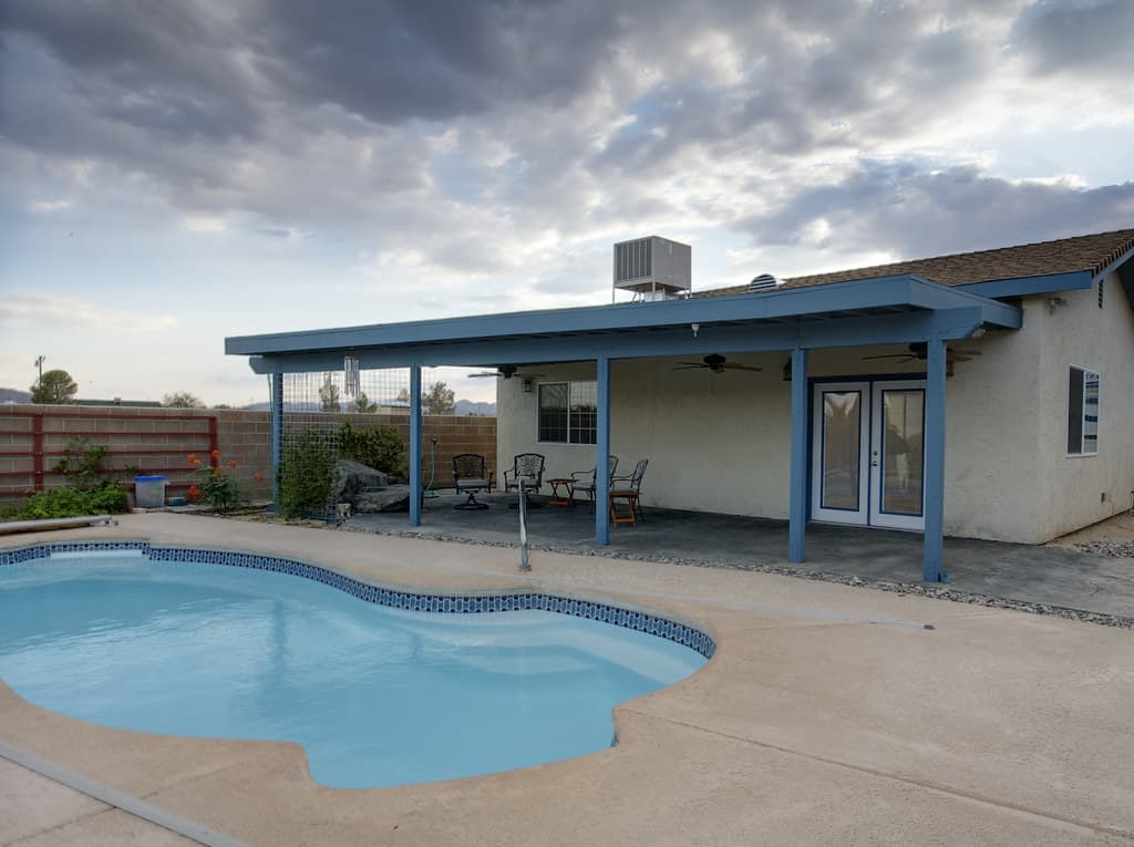 Concrete Patio vs. Wood Deck: Cost and Value Compared