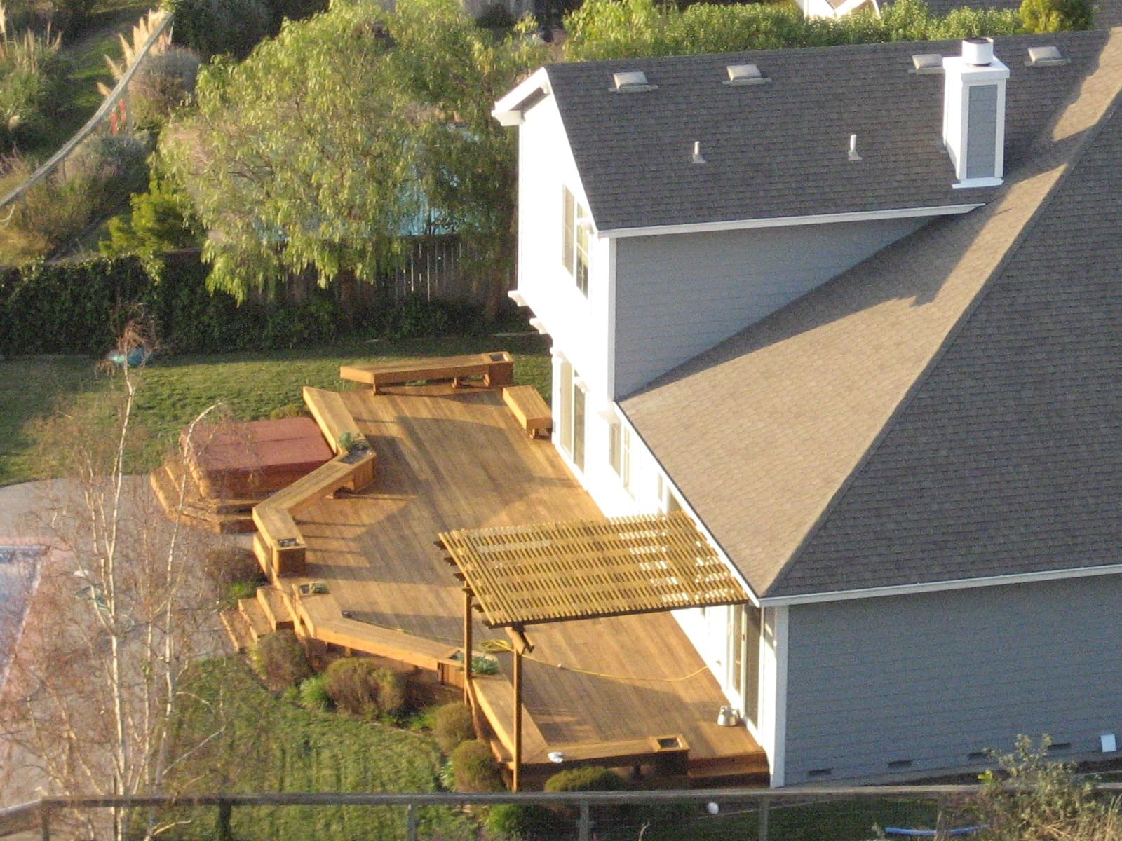 Concrete Patio vs. Wood Deck: Cost and Value Compared photo 1