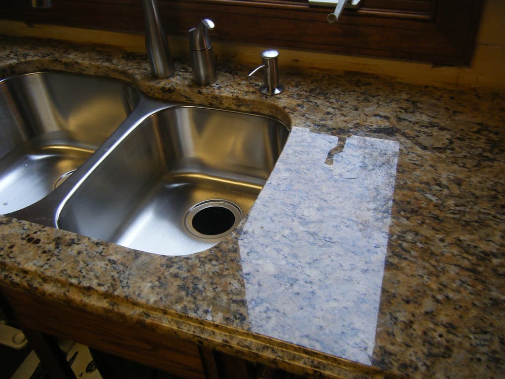 Quartz vs. Granite vs. Laminate Countertops Compared photo 4