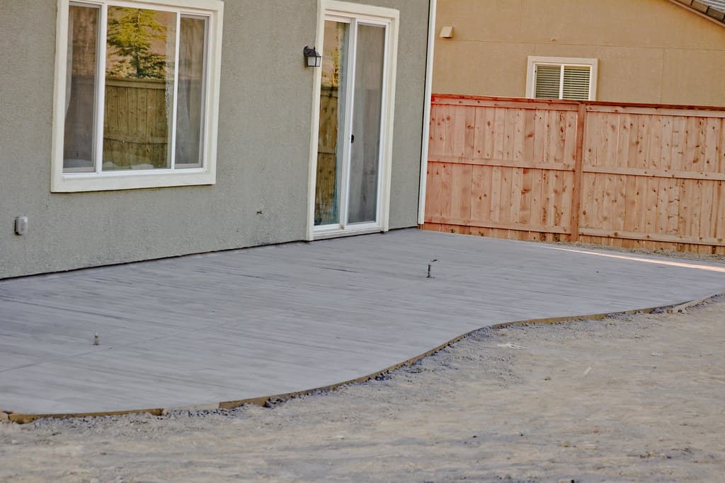 Small Backyard Patio Ideas That Actually Work with Concrete photo 1