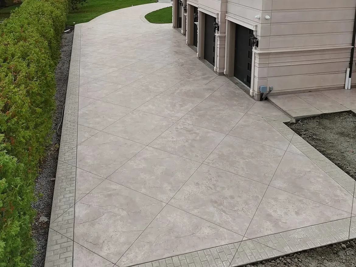 Concrete Driveway vs. Interlock vs. Asphalt: What Costs Less