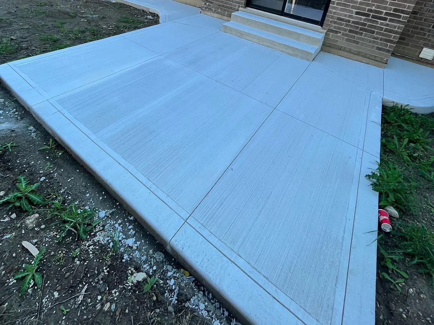 Concrete Patio vs. Wood Deck: Cost and Value Compared